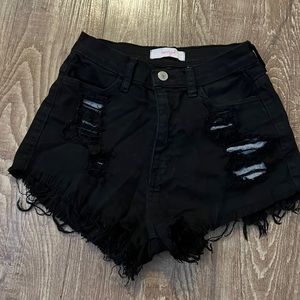 Black denim cutoff shorts